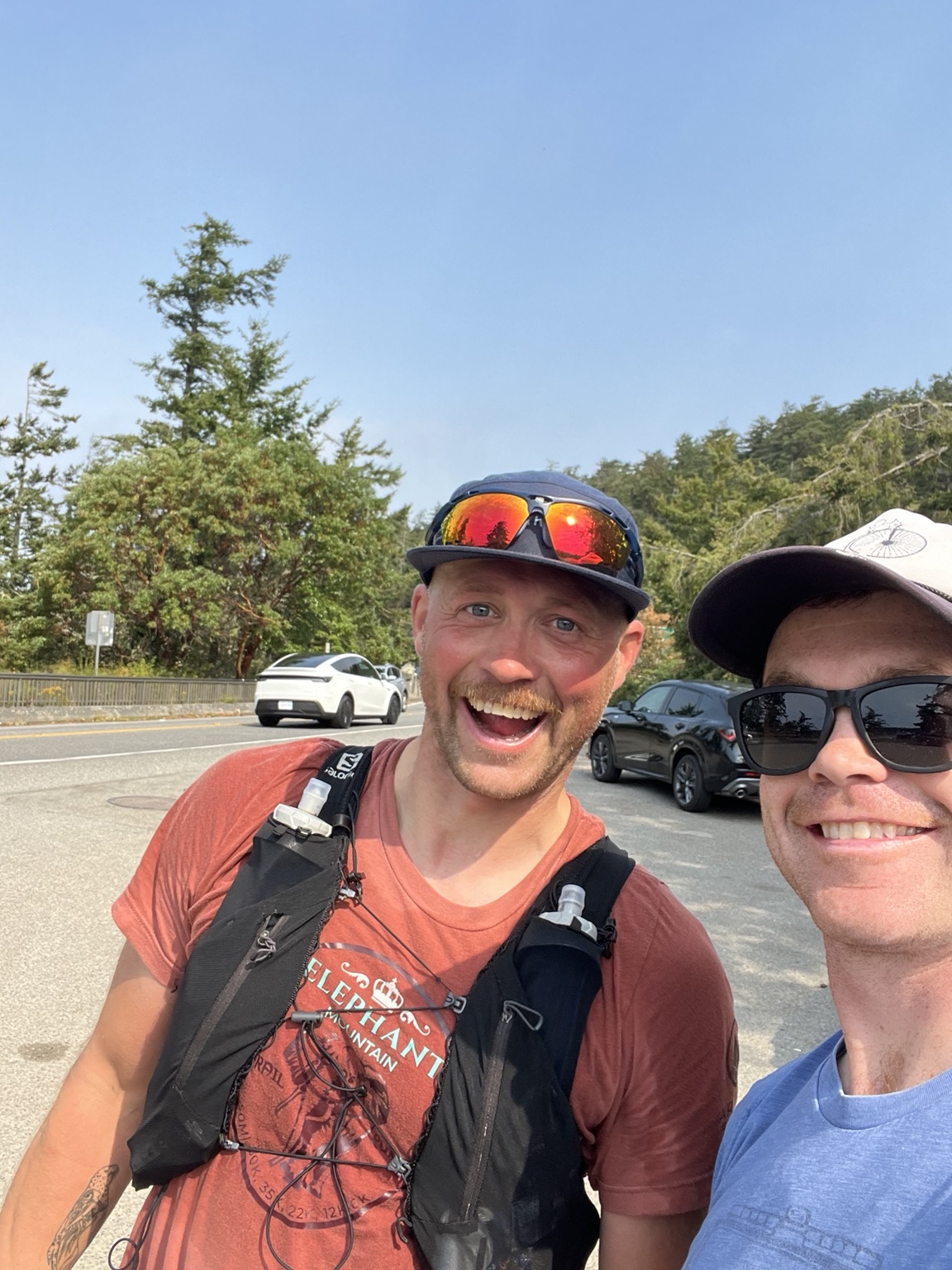 Matthew smiling with a friend after the day's run