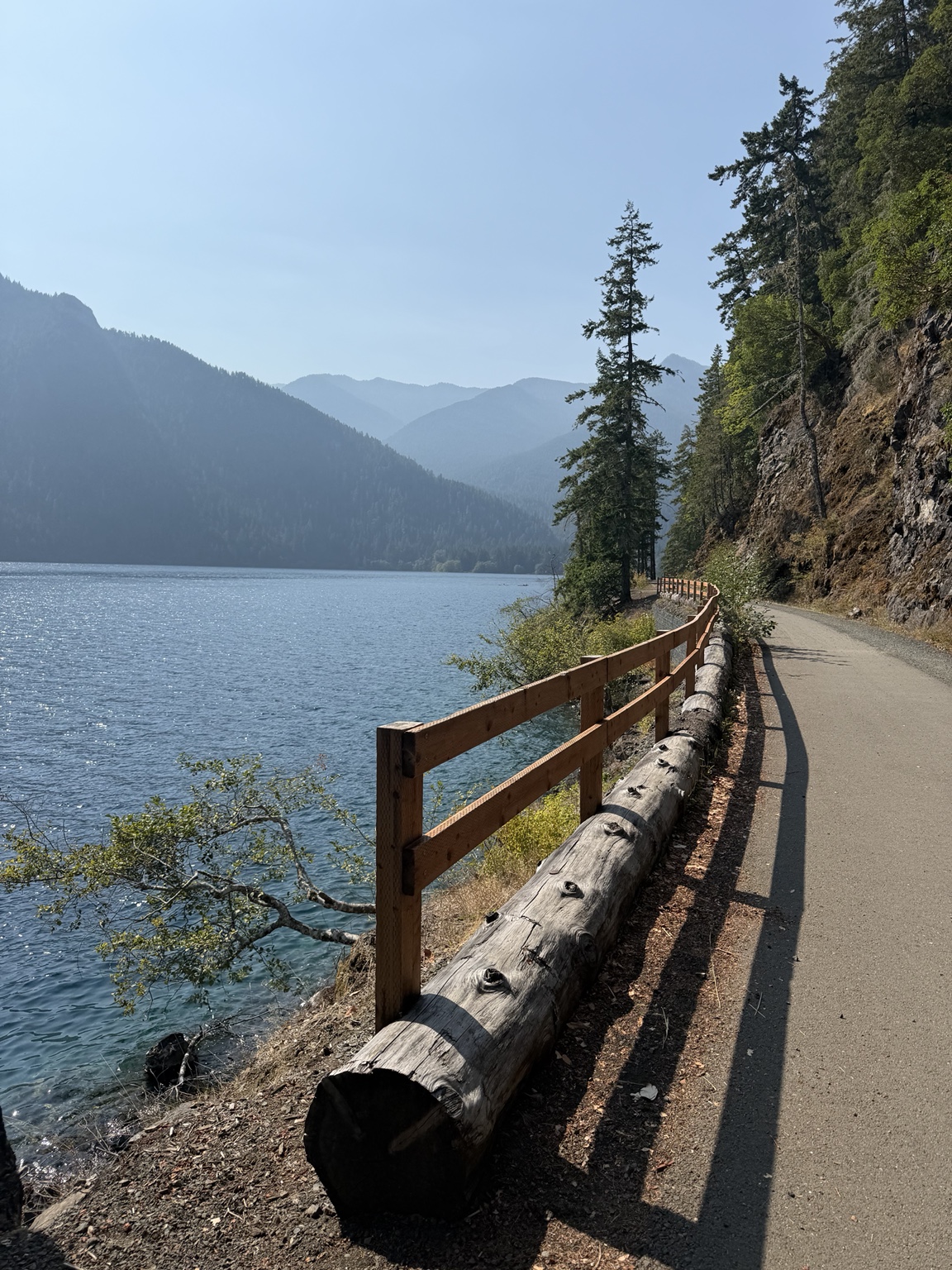 The Spruce Railroad Trail winding beside Lake Crescent and forested mountains