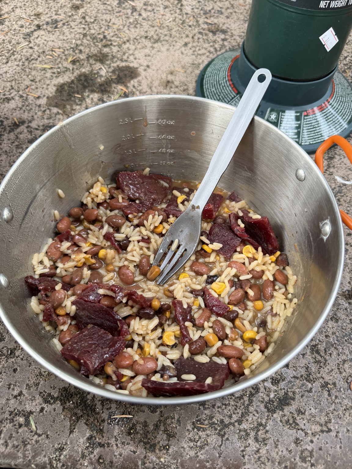A warm meal in a cooking pot at camp after Day 9