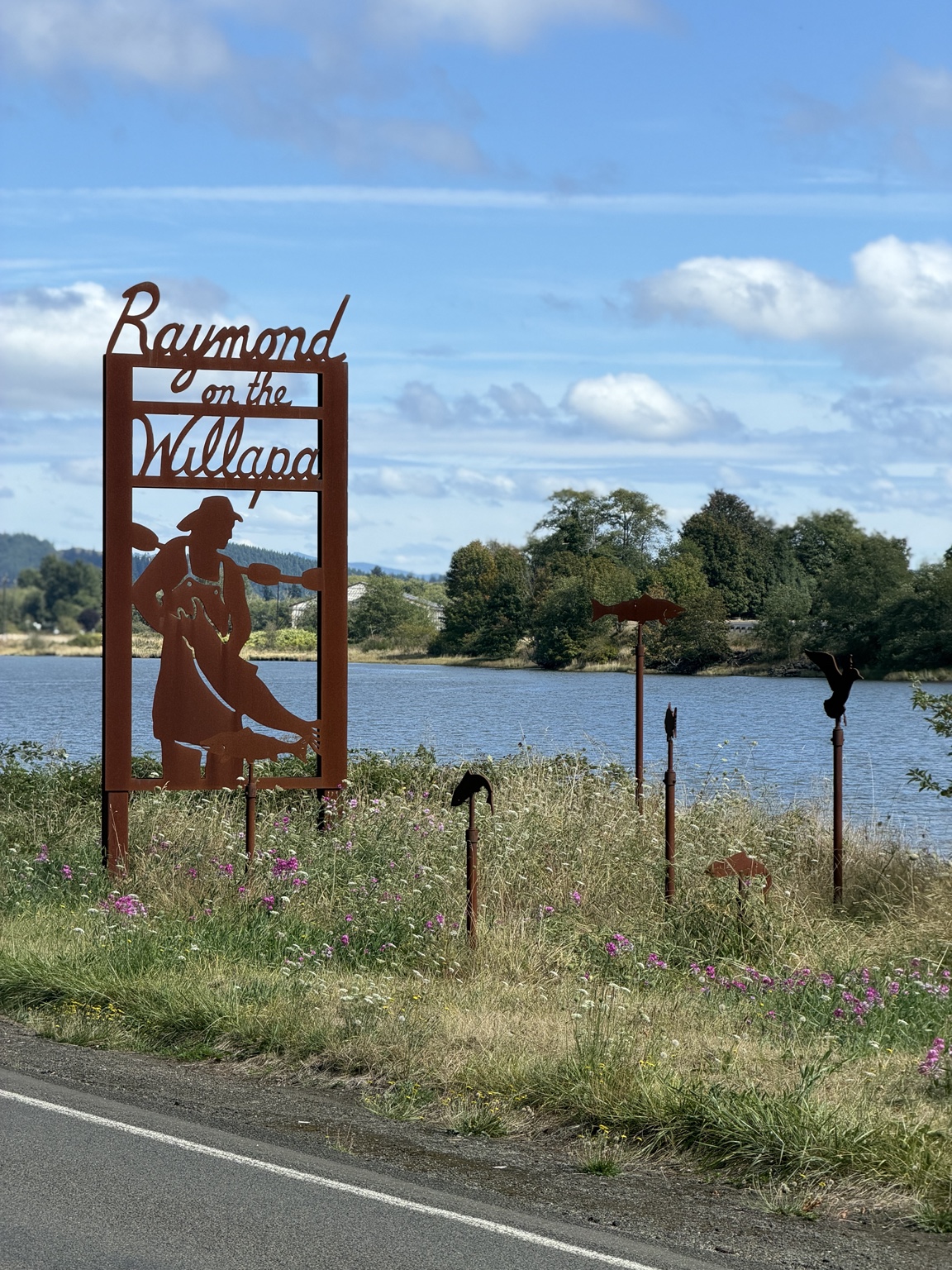 Raymond on the Willapa metal artwork beside the waterfront